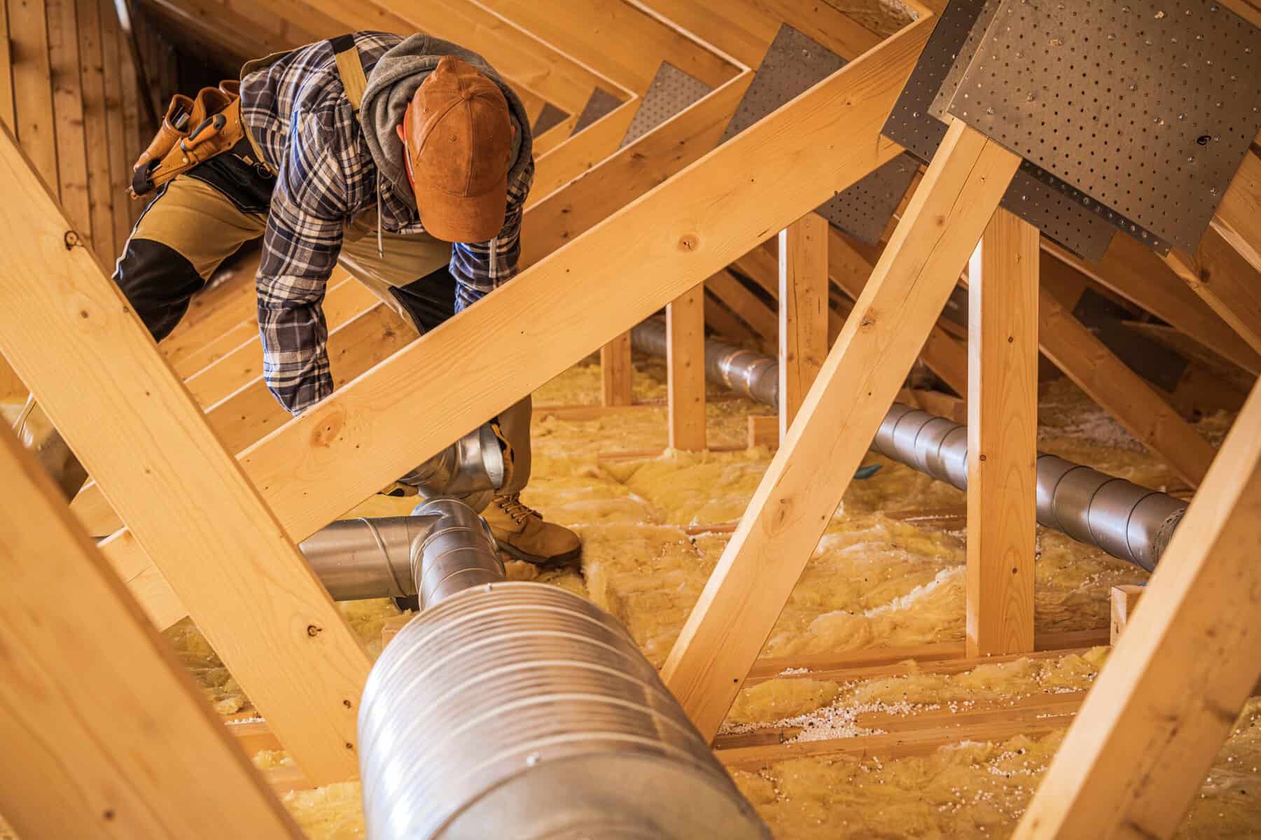 HVAC Worker Installing Air Ducts