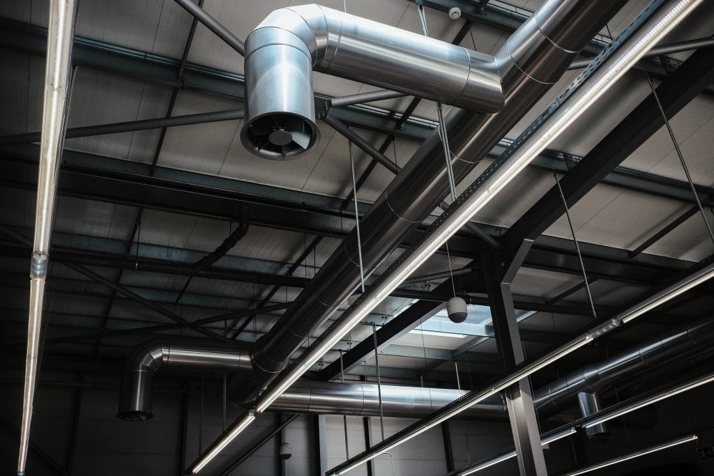 Low angle shot of pipes in the construction